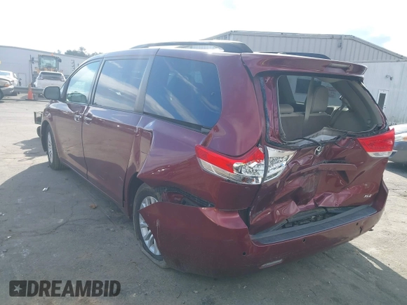 2014 Toyota Sienna XLE with VIN 5TDYK3DCXES442968, listed as a IAAI auction lot 41241310 with 132,020 mi miles and . Bid and sale history available at DreamBid. Image 3.