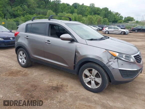 2013 Kia Sportage LX with VIN KNDPBCA29D7495287, listed as a IAAI auction lot 42537122 with 221,052 mi miles and . Bid and sale history available at DreamBid. Image 1.