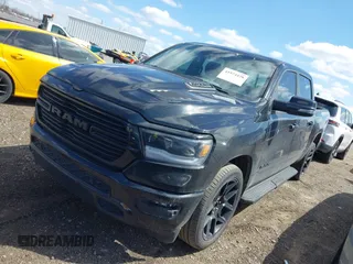 2023 Ram 1500 Laramie with VIN 1C6SRFJT6PN542105, listed as a IAAI auction lot 41974428 with 74,489 mi miles and . Bid and sale history available at DreamBid. Image 18.