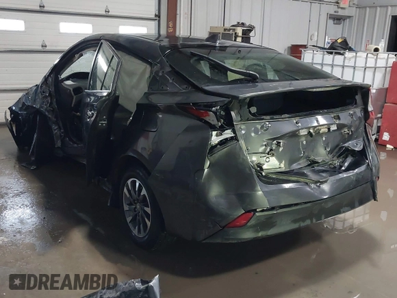 2021 Toyota Prius L Eco z VIN JTDKAMFU9M3132587, wystawiony jako IAAI lot #41637275 z przebiegiem 84 203 mil mil oraz . Historia ofert i sprzedaży dostępna na DreamBid. Obrazek 3.