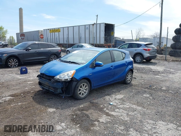 2014 Toyota Prius One with VIN JTDKDTB33E1565723, listed as a IAAI auction lot 42070826 with 145,811 mi miles and . Bid and sale history available at DreamBid. Image 18.