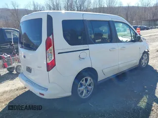 2014 Ford Transit Connect XLT z VIN NM0AE8F7XE1148356, wystawiony jako IAAI lot #41658732 z przebiegiem 128 180 mil mil oraz . Historia ofert i sprzedaży dostępna na DreamBid. Obrazek 4.