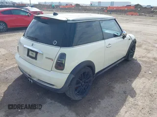 2006 MINI Hardtop S with VIN WMWRE335X6TL19914, listed as a IAAI auction lot 41680041 with 213,011 mi miles and . Bid and sale history available at DreamBid. Image 4.