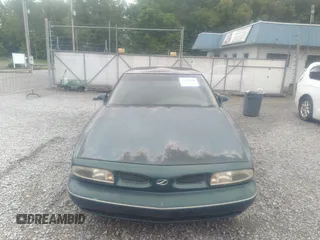 1998 Oldsmobile 88 LS z VIN 1G3HN52K5W4849011, wystawiony jako IAAI lot #42153650 z przebiegiem 171 969 mil mil oraz . Historia ofert i sprzedaży dostępna na DreamBid. Obrazek 12.