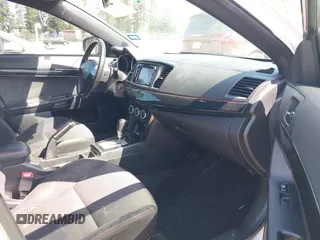 2017 Mitsubishi Lancer ES with VIN JA32U2FU5HU015258, listed as a IAAI auction lot 42121579 with 175,762 mi miles. Bid and sale history available at carsss.com. Image 5.