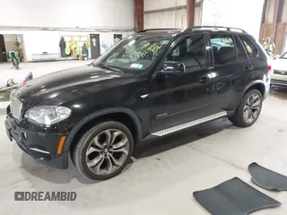2012 BMW X5 50i with VIN 5UXZV8C50CL425721, listed as a IAAI auction lot 42590676 with 192,355 mi miles and . Bid and sale history available at DreamBid. Image 2.