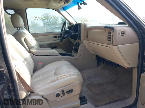 2003 Chevrolet Suburban LT z VIN 1GNEC16Z13J216552, wystawiony jako IAAI lot #40193670 z przebiegiem 235 840 mil mil oraz . Historia ofert i sprzedaży dostępna na DreamBid. Obrazek 5.
