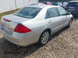 2006 Honda Accord LX with VIN 1HGCM66366A039749, listed as a IAAI auction lot 42441238 with 306,786 mi miles and . Bid and sale history available at DreamBid. Image 4.