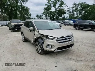 2017 Ford Escape Titanium with VIN 1FMCU0J95HUB96659, listed as a Copart auction lot 54053775 with 69,744 mi miles and Salvage Title. Bid and sale history available at DreamBid. Image 13.