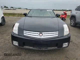 2004 Cadillac XLR z VIN 1G6YV34A445600668, wystawiony jako Copart lot #74595824 z przebiegiem Nie podano mil oraz Szkody całkowita. Historia ofert i sprzedaży dostępna na DreamBid. Obrazek 5.