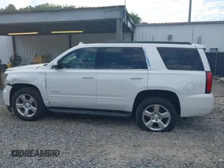 2017 Chevrolet Tahoe LT with VIN 1GNSKBKC3HR356480, listed as a IAAI auction lot 42335162 with 145,892 mi miles and . Bid and sale history available at DreamBid. Image 14.