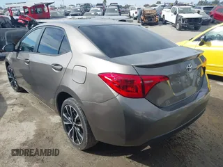 2017 Toyota Corolla L z VIN 5YFBURHE5HP730912, wystawiony jako IAAI lot #41610019 z przebiegiem 61 440 mil mil oraz . Historia ofert i sprzedaży dostępna na DreamBid. Obrazek 3.