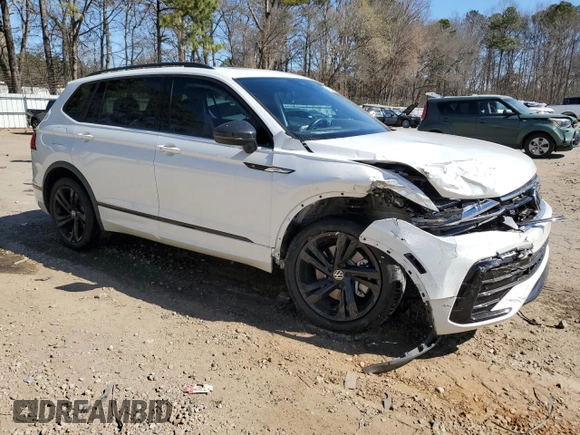 2023 Volkswagen Tiguan SE R-Line Black with VIN 3VVCB7AX6PM001044, listed as a Copart auction lot 47365565 with 20,059 mi miles and Salvage title. Bid and sale history available at DreamBid. Image 4.