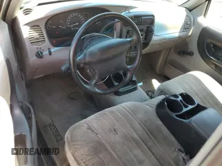 1997 Ford Ranger XLT z VIN 1FTCR14X7VPA98300, wystawiony jako Copart lot #64032695 z przebiegiem 469 086 mil mil oraz Czysty tytuł • Clean title. Historia ofert i sprzedaży dostępna na DreamBid. Obrazek 8.