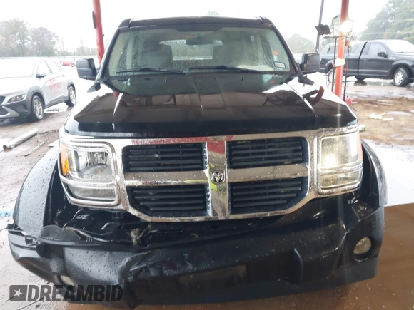2007 Dodge Nitro SXT with VIN 1D8GT28K67W683600, listed as a IAAI auction lot 40958011 with 70,141 mi miles. Bid and sale history available at carsss.com. Image 6.