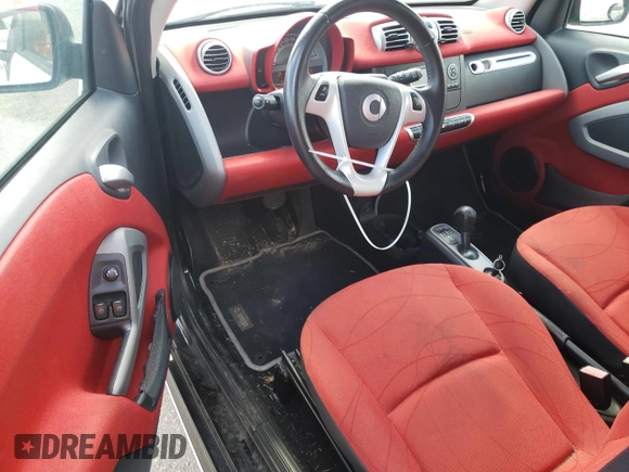 2011 Smart fortwo Pure with VIN WMEEJ3BAXBK447292, listed as a Copart auction lot 73308384 with 35,166 mi miles and Salvage title. Bid and sale history available at DreamBid. Image 8.