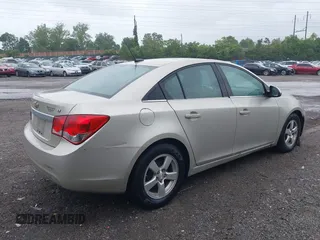 2014 Chevrolet Cruze 1LT z VIN 1G1PC5SB7E7194180, wystawiony jako IAAI lot #42331565 z przebiegiem 78 737 mil mil oraz . Historia ofert i sprzedaży dostępna na DreamBid. Obrazek 4.