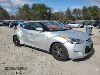 2013 Hyundai Veloster w/Black Int z VIN KMHTC6AD6DU121277, wystawiony jako Copart lot #53222805 z przebiegiem 155 236 mil mil oraz Czysty tytuł • Clean title. Historia ofert i sprzedaży dostępna na DreamBid. Obrazek 4.