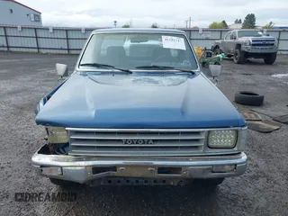 1988 Toyota Pickup with VIN JT4RN50R5J5169942, listed as a IAAI auction lot 42152517 with 218,579 mi miles and . Bid and sale history available at DreamBid. Image 13.