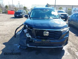 2023 Honda Pilot Elite with VIN 5FNYG1H80PB017732, listed as a IAAI auction lot 41643842 with 26,420 mi miles. Bid and sale history available at carsss.com. Image 6.