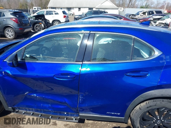 2021 Lexus UX with VIN JTHR9JBH1M2050209, listed as a IAAI auction lot 41874736 with 31,536 mi miles. Bid and sale history available at carsss.com. Image 13.