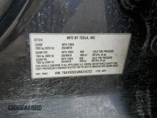 2024 Tesla Model Y Long Range with VIN 7SAYGDEE4RA316722, listed as a Copart auction lot 53207395 with 17,006 mi miles and Salvage title. Bid and sale history available at DreamBid. Image 14.