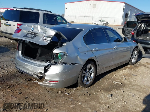 2018 BMW 3 Series 330i with VIN WBA8B9G58JNU97318, listed as a IAAI auction lot 41205434 with 62,582 mi miles and . Bid and sale history available at DreamBid. Image 4.