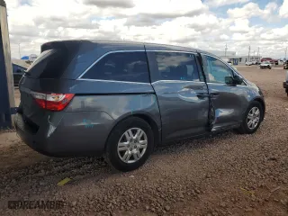 2012 Honda Odyssey LX with VIN 5FNRL5H21CB013296, listed as a Copart auction lot 48512625 with 69,381 mi miles and Salvage Title. Bid and sale history available at carsss.com. Image 3.