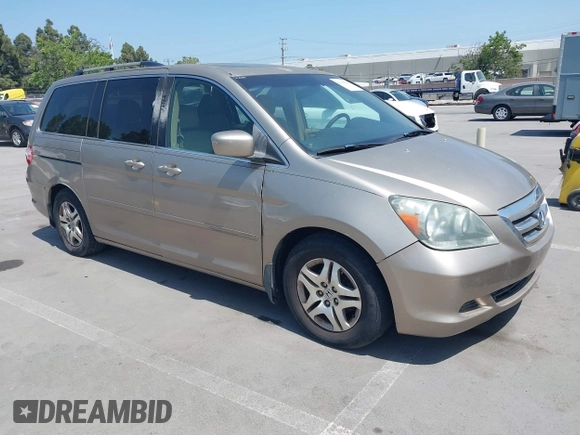 2005 Honda Odyssey EX-L with VIN 5FNRL38705B087733, listed as a IAAI auction lot 42165084 with 254,357 mi miles. Bid and sale history available at carsss.com. Image 1.