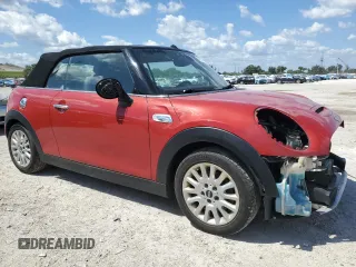 2016 MINI Convertible S with VIN WMWWG9C51G3A92388, listed as a Copart auction lot 43527125 with 144,454 mi miles and Salvage Title. Bid and sale history available at DreamBid. Image 4.