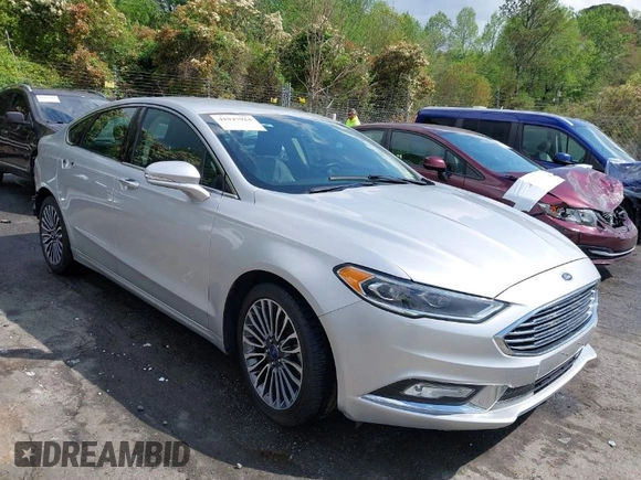 2017 Ford Fusion Titanium with VIN 3FA6P0K90HR266556, listed as a IAAI auction lot 41947924 with 135,628 mi miles. Bid and sale history available at carsss.com. Image 1.