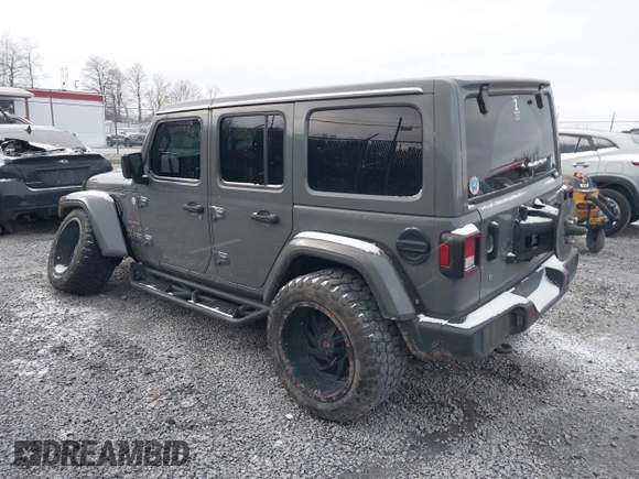 2019 Jeep Wrangler Unlimited Sahara with VIN 1C4HJXEG8KW533339, listed as a IAAI auction lot 40963653 with 69,202 mi miles and . Bid and sale history available at DreamBid. Image 3.