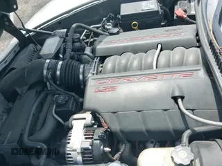 2006 Chevrolet Corvette z VIN 1G1YY36U165112690, wystawiony jako IAAI lot #42562690 z przebiegiem 142 328 mil mil oraz . Historia ofert i sprzedaży dostępna na DreamBid. Obrazek 19.