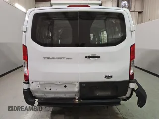2023 Ford Transit Cargo with VIN 1FTBR1Y86PKA17978, listed as a Copart auction lot 77180324 with 20,173 mi miles and Clean Title. Bid and sale history available at DreamBid. Image 6.