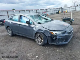 2019 Subaru Impreza Premium with VIN 4S3GKAC62K3609929, listed as a IAAI auction lot 41948063 with 66,540 mi miles. Bid and sale history available at carsss.com. Image 1.