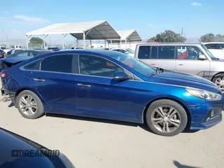 2018 Hyundai Sonata SEL with VIN 5NPE34AF1JH610095, listed as a IAAI auction lot 41692478 with 141,912 mi miles and . Bid and sale history available at carsss.com. Image 12.