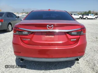 2014 Mazda 6 i Grand Touring с VIN JM1GJ1W64E1121399, выставлен на аукционе Copart как лот 57513405 с пробегом 161 286 миль миль и Списание • Salvage title. История ставок и продаж доступна на DreamBid. Изображение 6.