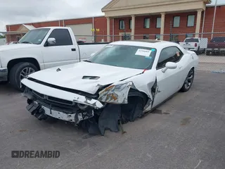 2015 Dodge Challenger SXT Plus with VIN 2C3CDZBG8FH906356, listed as a IAAI auction lot 42396865 with 184,565 mi miles and . Bid and sale history available at DreamBid. Image 6.