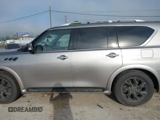 2012 Infiniti QX56 7-passenger z VIN JN8AZ2NE1C9020708, wystawiony jako IAAI lot #42128814 z przebiegiem 173 403 mil mil oraz . Historia ofert i sprzedaży dostępna na DreamBid. Obrazek 14.