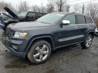 2013 Jeep Grand Cherokee Overland with VIN 1C4RJFCT6DC586933, listed as a Copart auction lot 45499294 with 80,249 mi miles and Salvage Title. Bid and sale history available at carsss.com. Image 1.