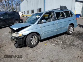 2003 Honda Odyssey EX-L z VIN 5FNRL18983B054076, wystawiony jako Copart lot #50761575 z przebiegiem Nie podano mil oraz Szkoda całkowita • Salvage title. Historia ofert i sprzedaży dostępna na DreamBid. Obrazek 1.