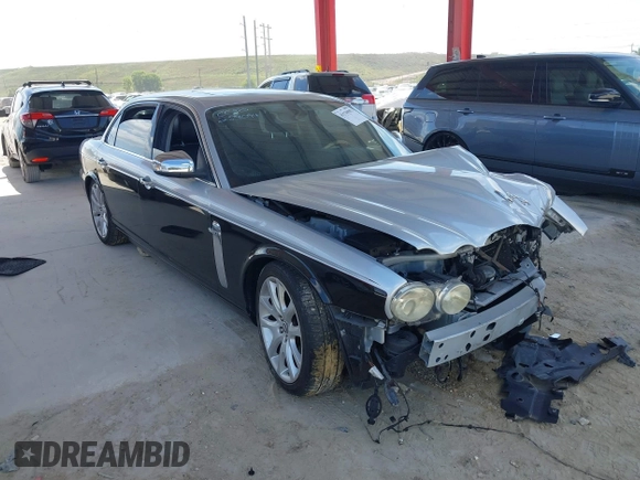 2008 Jaguar XJ with VIN SAJWA79B48SH22788, listed as a IAAI auction lot 41530902 with 124,334 mi miles. Bid and sale history available at carsss.com. Image 1.