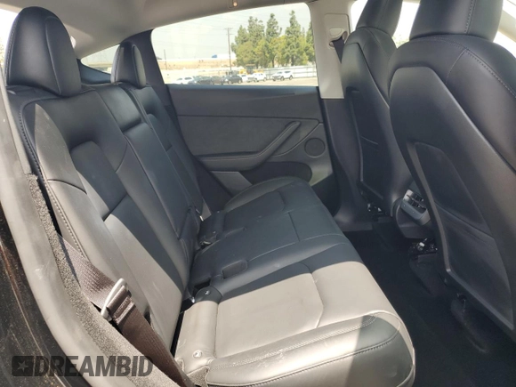 2024 Tesla Model Y Long Range with VIN 7SAYGDEE4RA228916, listed as a Copart auction lot 54921575 with 13,607 mi miles and Salvage title. Bid and sale history available at DreamBid. Image 11.