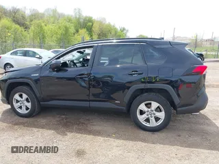 2021 Toyota RAV4 Hybrid LE with VIN 2T3L6RFV7MW011159, listed as a IAAI auction lot 42212998 with 104,626 mi miles and . Bid and sale history available at DreamBid. Image 14.
