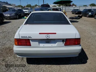 1992 Mercedes-Benz 500 z VIN WDBFA66E7NF049079, wystawiony jako Copart lot #52642285 z przebiegiem 69 976 mil mil oraz Szkody całkowita. Historia ofert i sprzedaży dostępna na DreamBid. Obrazek 6.