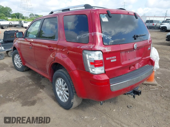 2011 Mercury Mariner Premier z VIN 4M2CN8HG1BKJ06957, wystawiony jako IAAI lot #42455616 z przebiegiem 206 388 mil mil oraz . Historia ofert i sprzedaży dostępna na DreamBid. Obrazek 3.