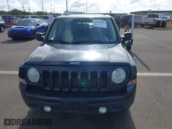 2014 Jeep Patriot Latitude with VIN 1C4NJPFA9ED679293, listed as a IAAI auction lot 42078681 with 94,124 mi miles and . Bid and sale history available at DreamBid. Image 6.