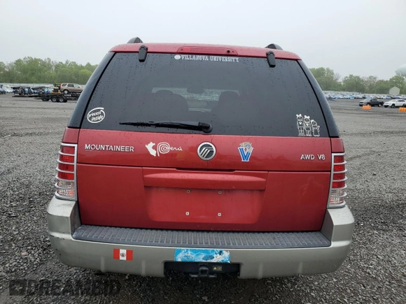2002 Mercury Mountaineer z VIN 4M2ZU86W82UJ34069, wystawiony jako Copart lot #55499815 z przebiegiem 157 492 mil mil oraz Szkody całkowita. Historia ofert i sprzedaży dostępna na DreamBid. Obrazek 6.