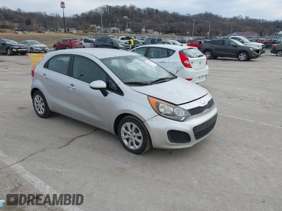 2013 Kia Rio LX with VIN KNADM5A30D6226681, listed as a IAAI auction lot 41657362 with 127,569 mi miles. Bid and sale history available at carsss.com. Image 1.