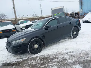 2014 Ford Sedan Police Interceptor with VIN 1FAHP2MK9EG101144, listed as a IAAI auction lot 41755855 with 160,659 mi miles. Bid and sale history available at carsss.com. Image 2.